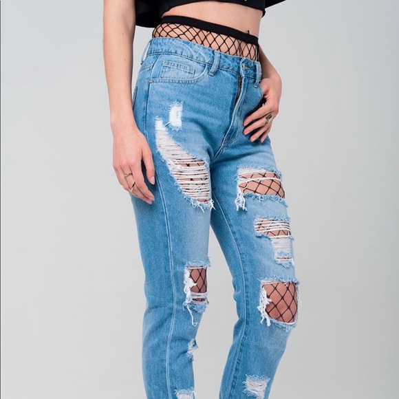 Ripped jeans with fishnet tights - Picture 2 of 4